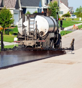 Seal coating residential asphalt road