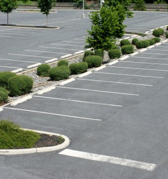 Commercial parking lot with new asphalt paving